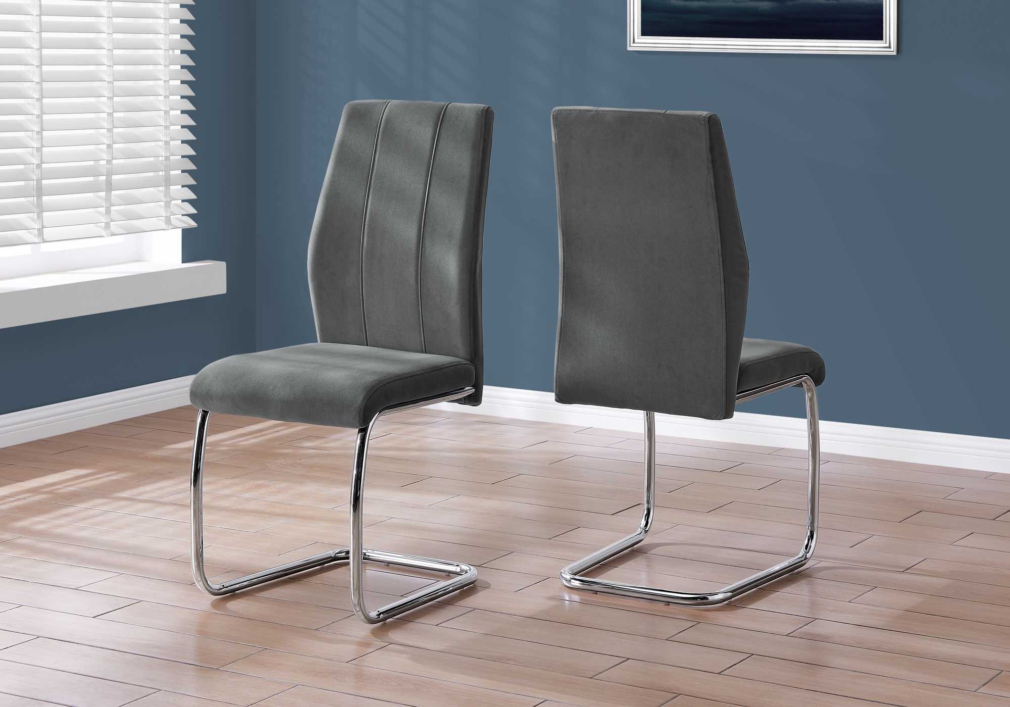 Two 77.5" Dark Grey Velvet, Chrome Metal, and Foam Dining Chairs