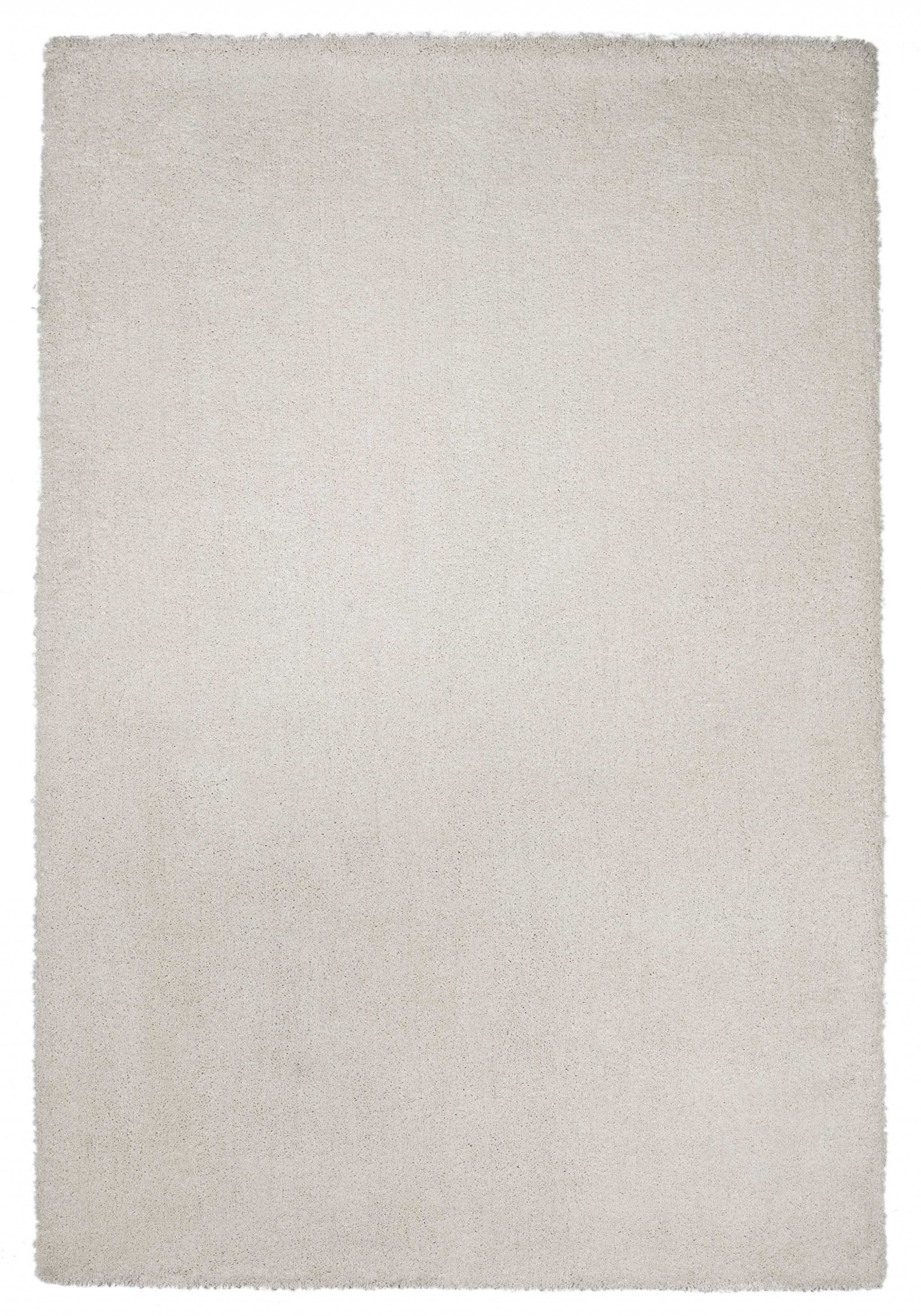 5' x 7' Polyester Ivory Area Rug